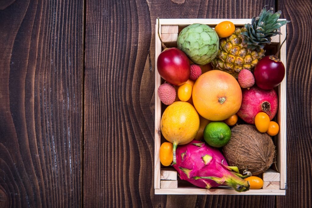 Wooden box with exotic fruits
